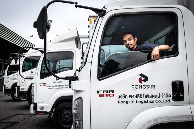 Pongsiri driver seated in a delivery truck