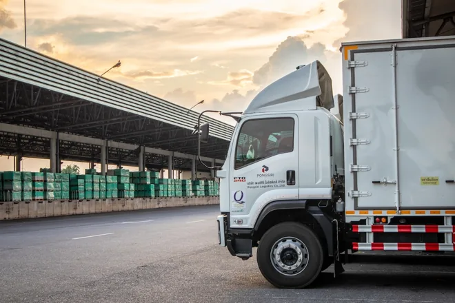 Delivery truck next to the warehouse loading area